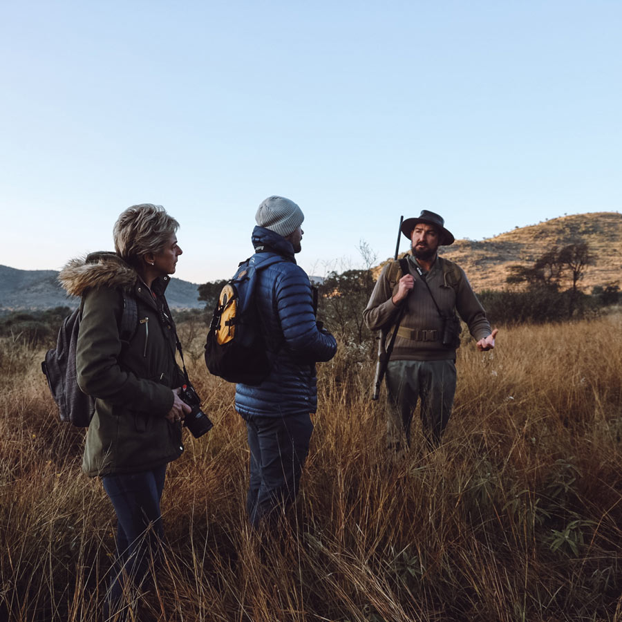 Three people on walking safari